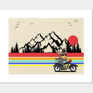 Dog riding a motorcycle with a mountain backdrop and sunset Posters and Art